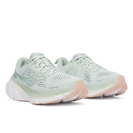 Guide 18 - Women by Saucony in pale green and peach with PWRRUN cushioning and CenterPath technology for road running comfort and support