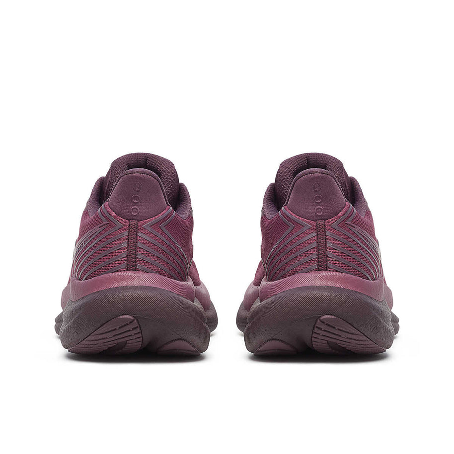 Triumph 23 - Women by Saucony in dark purple with PWRRUN PB midsole cushioning for long-distance road running and responsive ride