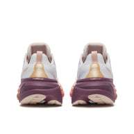 Hurricane 25 - Women by Saucony in white, pink, and mauve with max cushioning and responsive superfoam for comfortable road running