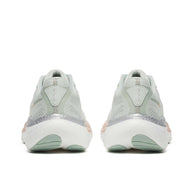 Ride 19 - Women by Saucony in light green and pink, lightweight responsive road running shoe designed for easy and fast runs