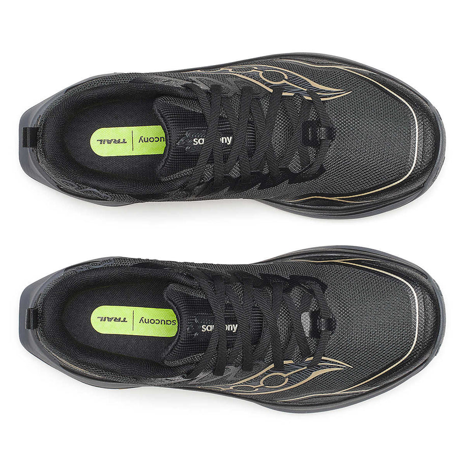 Peregrine 16 Wide - Women by Saucony in black with gold accents, trail running shoe with Vibram Megagrip outsole for rugged terrain and cushioning