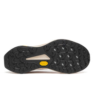 Peregrine 16 - Women by Saucony in beige and black with Vibram Megagrip sole for rugged trail running and outdoor grip