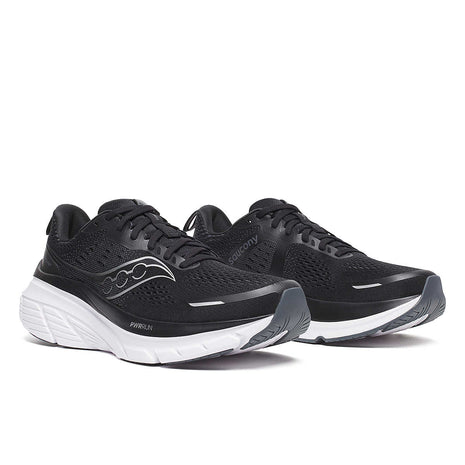 Guide 18 - Men by Saucony in black and white with PWRRUN cushioning and CenterPath tech for road running and comfort