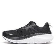 Guide 18 - Men by Saucony in black with white sole, cushioned running shoes with PWRRUN and CenterPath for road running and comfort