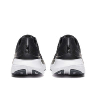 Guide 18 - Men by Saucony in black and white with PWRRUN cushioning and CenterPath tech for road running and comfort
