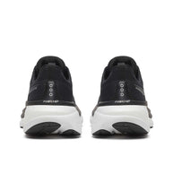 Hurricane 25 Wide - Men by Saucony in black and white with max cushioning and responsive superfoam for road running and comfort