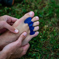 Correct Toes Sport in blue by Correct Toes, toe spacer designed to restore natural toe alignment and improve foot muscle strength for sports