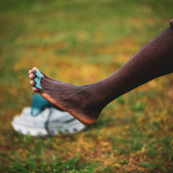 Correct Toes Sport in light blue by Correct Toes, toe spacers designed to improve natural toe alignment and strengthen foot muscles