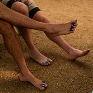 Correct Toes Sport in blue and black by Correct Toes, toe spacers designed to improve natural toe alignment and foot strength for active use