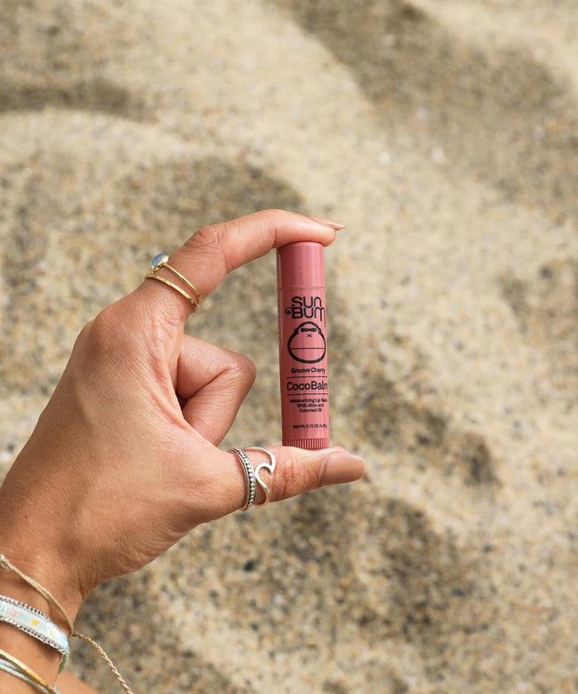 CocoBalm Lip Balm by Sun Bum in pink, moisturizing lip care with coconut oil and aloe vera for smooth, hydrated lips