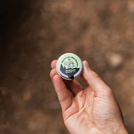 All Natural Anti-Chafe Salve (Metal Tin) by Squirrel's Nut Butter in green and black, natural skin protector for chafing and blisters