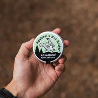 All Natural Anti-Chafe Salve (Metal Tin) by Squirrel's Nut Butter in green and silver, natural skin protection for chafing and blisters