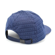Low Light Tech Cap by Rabbit in navy with reflective pattern, adjustable fit, designed for visibility and safety in low light conditions