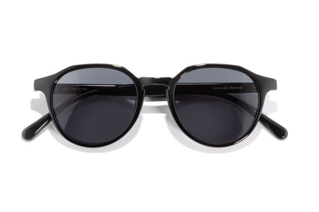 Sunski Vallarta sunglasses, front view of glossy black round frame with dark grey lenses