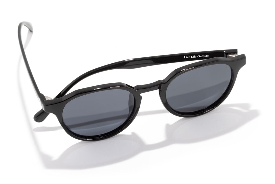 Vallarta by Sunski in black with lightweight sculpted arms, stylish sunglasses for men and women perfect for dressing up or casual wear