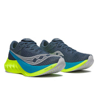 Endorphin PRO 4 - Women by Saucony in navy blue and neon yellow, responsive road running shoe designed for long-distance performance