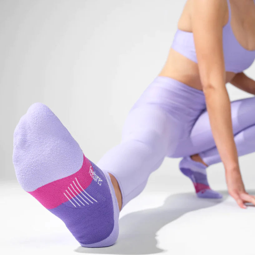 Elite Ultra Light Cushion No Show Tab - 2023 by Feetures in purple and pink, lightweight no show running socks with anatomical design and targeted comfort for running and active use