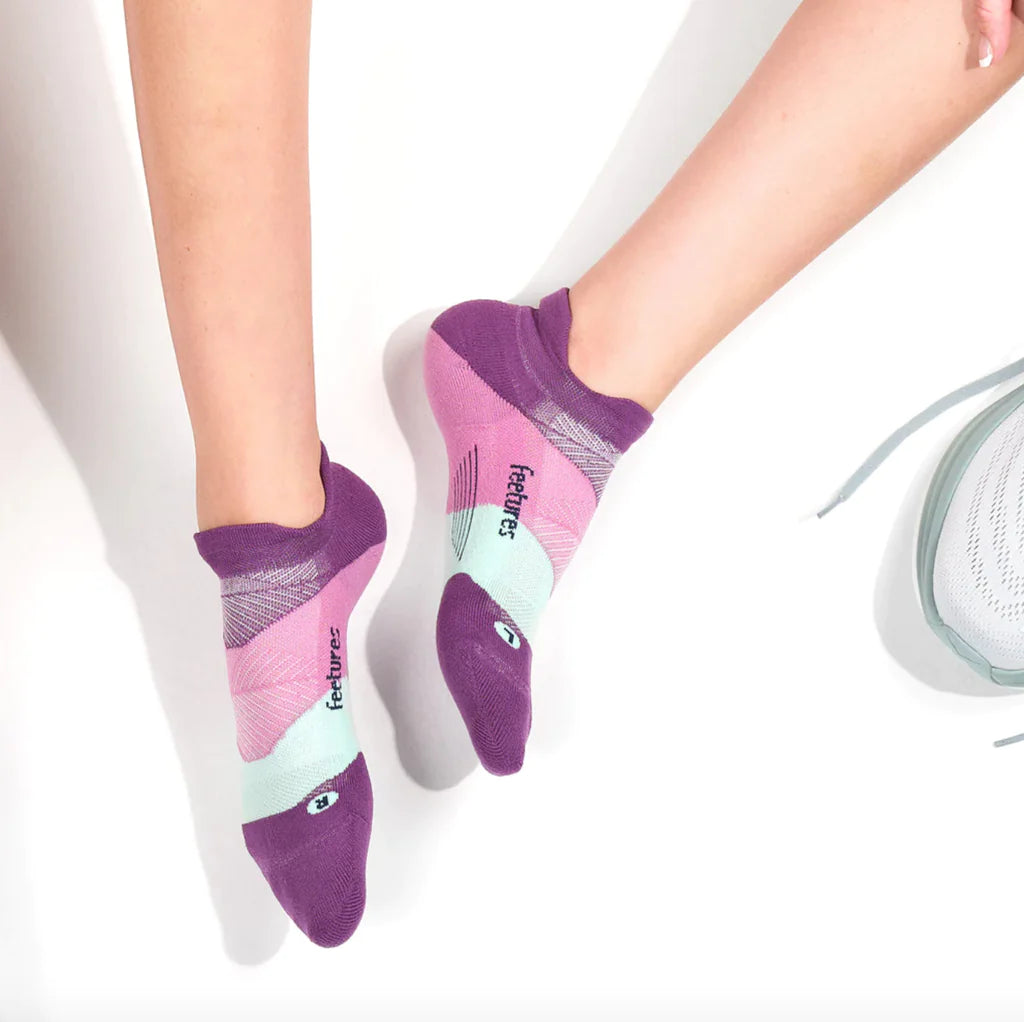 Elite Ultra Light Cushion No Show Tab - 2023 by Feetures in purple and pink, lightweight anatomical socks ideal for running and extra comfort