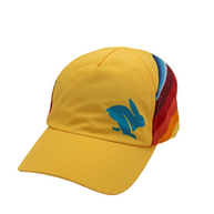 Elite Hat by Rabbit in yellow with rainbow side panels, lightweight wicking cap with laser-cut vents for sun and gear protection