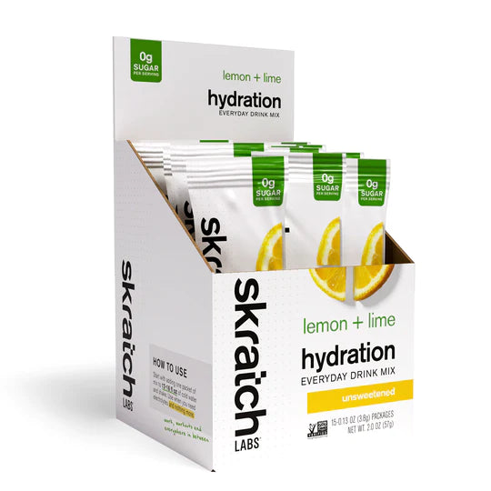 Everyday Drink Mix lemon + lime by Skratch Labs in white and green, unsweetened hydration mix with real fruit and electrolytes for daily use