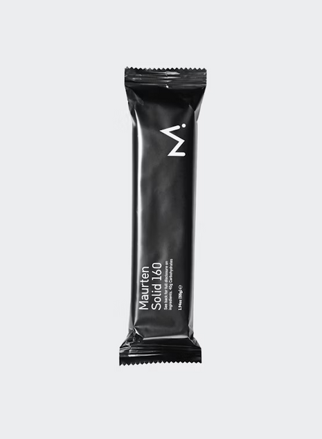 Solid 160 by Maurten in black packaging, energy bar for nutrition during running, training, and outdoor activities.