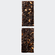 Solid C 160 by Maurten in dark brown with oats, energy bar designed for daily fuel during running, training, and outdoor activities