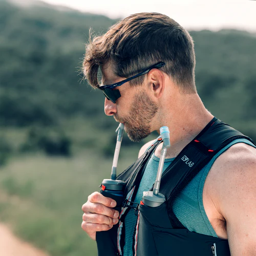 Run Flask Straw Adapter by Hydrapak in light blue, extending flask reach with easy pinch removal, ideal for running hydration use