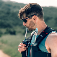 Run Flask Straw Adapter by Hydrapak in light blue, extending flask reach with easy pinch removal, ideal for running hydration use