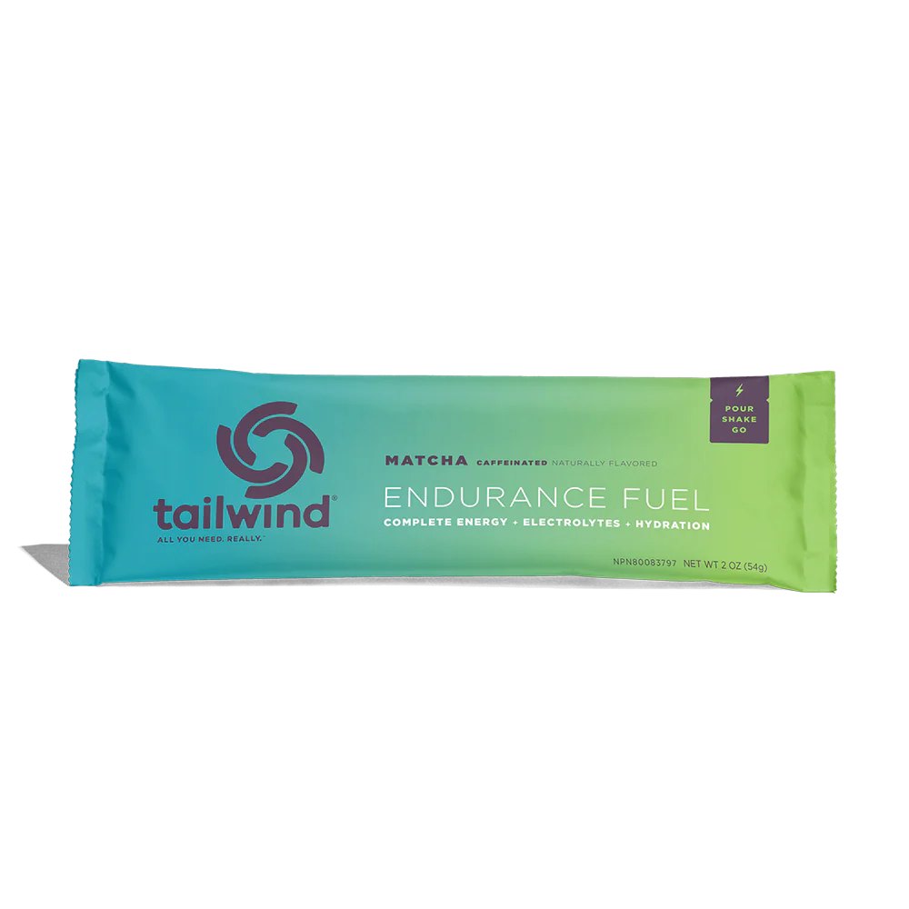 Endurance Fuel Caffeinated Singles by Tailwind in blue and green, caffeinated nutrition for energy, hydration, and electrolytes, ideal for running