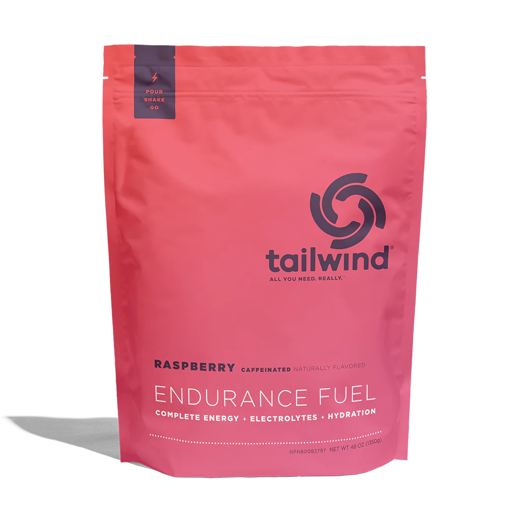 Endurance Fuel Caffeinated 50-Serving Bag by Tailwind in raspberry red, caffeinated nutrition for hydration, electrolytes, and energy during endurance activities