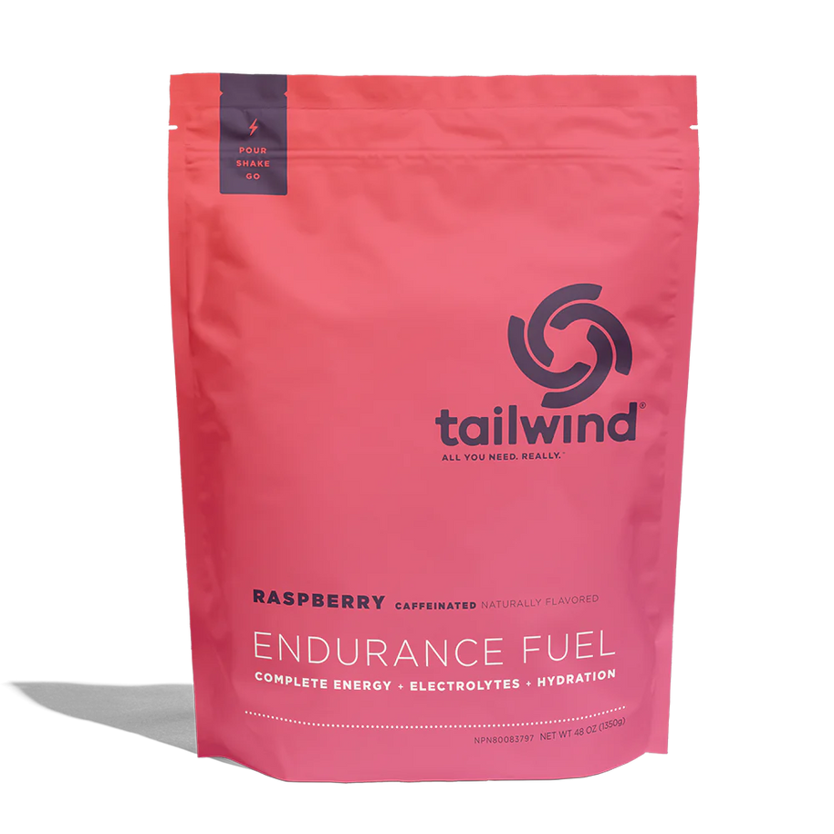 Endurance Fuel Caffeinated 50-Serving Bag by Tailwind in raspberry red, caffeinated nutrition for hydration, electrolytes, and energy during endurance activities