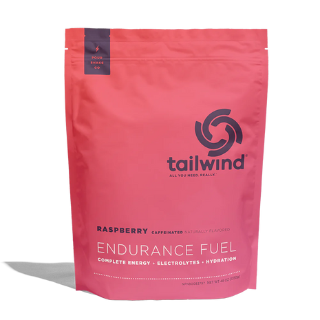 Endurance Fuel Caffeinated 50-Serving Bag by Tailwind in raspberry red, caffeinated nutrition for hydration, electrolytes, and energy during endurance activities