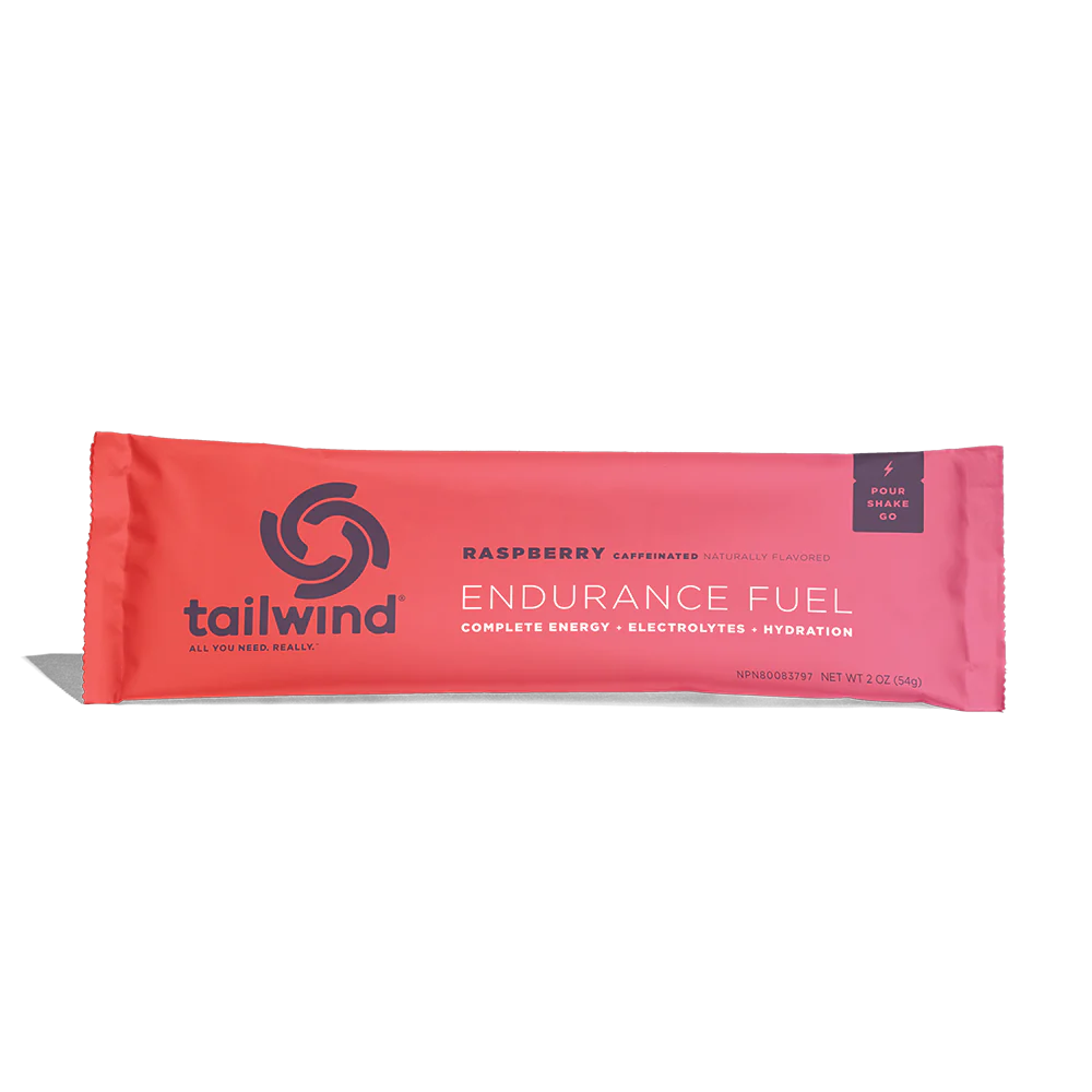 Endurance Fuel Caffeinated Singles by Tailwind in raspberry red, caffeinated nutrition for energy, hydration, and electrolytes during running