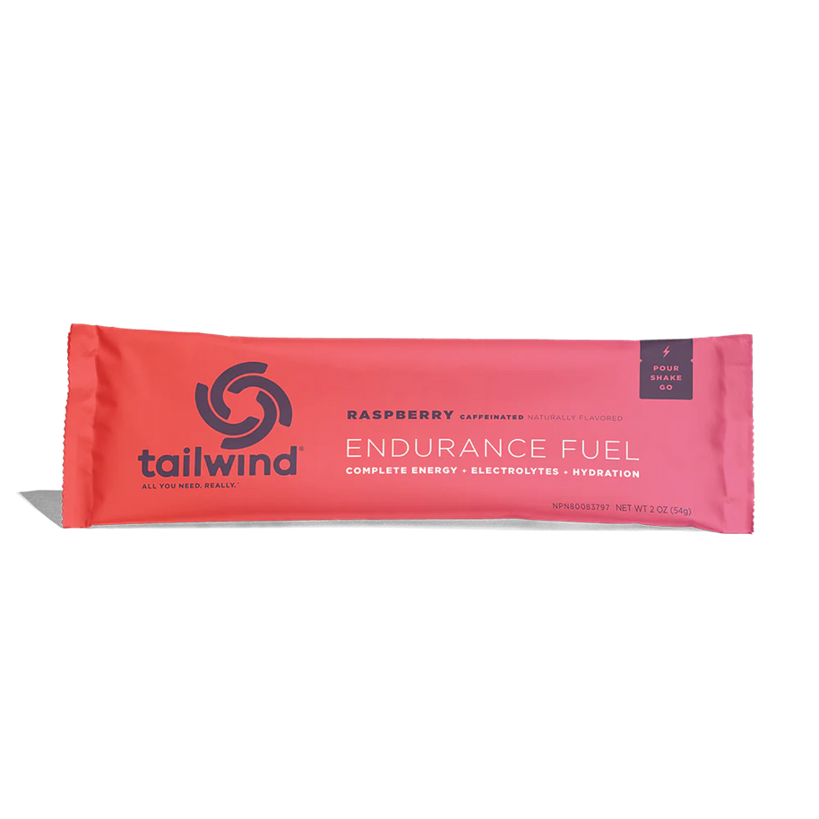 Endurance Fuel Caffeinated Singles by Tailwind in raspberry red, caffeinated nutrition for energy, hydration, and electrolytes during running