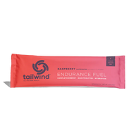 Endurance Fuel Caffeinated Singles by Tailwind in raspberry red, caffeinated nutrition for energy, hydration, and electrolytes during running