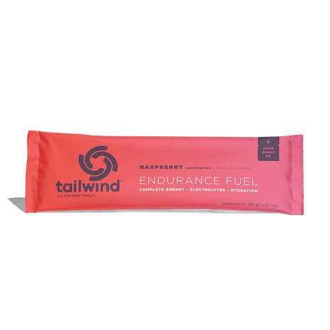 Endurance Fuel Caffeinated Singles by Tailwind in raspberry red, caffeinated nutrition for energy, hydration, and electrolytes during running