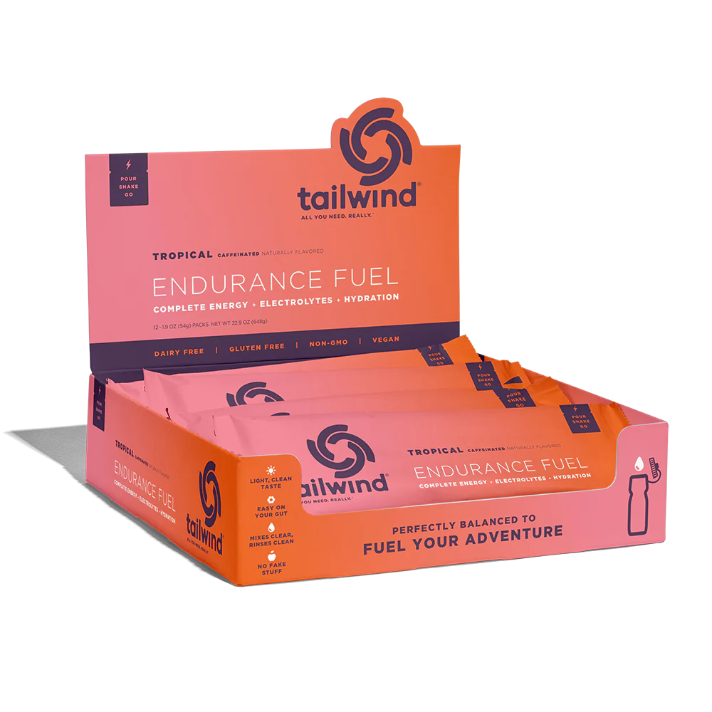 Endurance Fuel Caffeinated Singles by Tailwind in tropical orange, caffeinated energy packets with electrolytes for hydration and endurance fueling