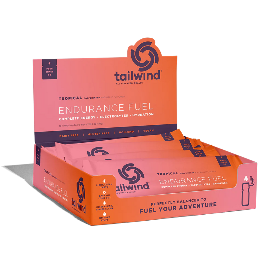 Endurance Fuel Caffeinated Singles by Tailwind in tropical orange, caffeinated energy packets with electrolytes for hydration and endurance fueling