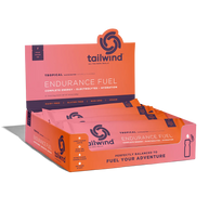 Endurance Fuel Caffeinated Singles by Tailwind in tropical orange, caffeinated energy packets with electrolytes for hydration and endurance fueling