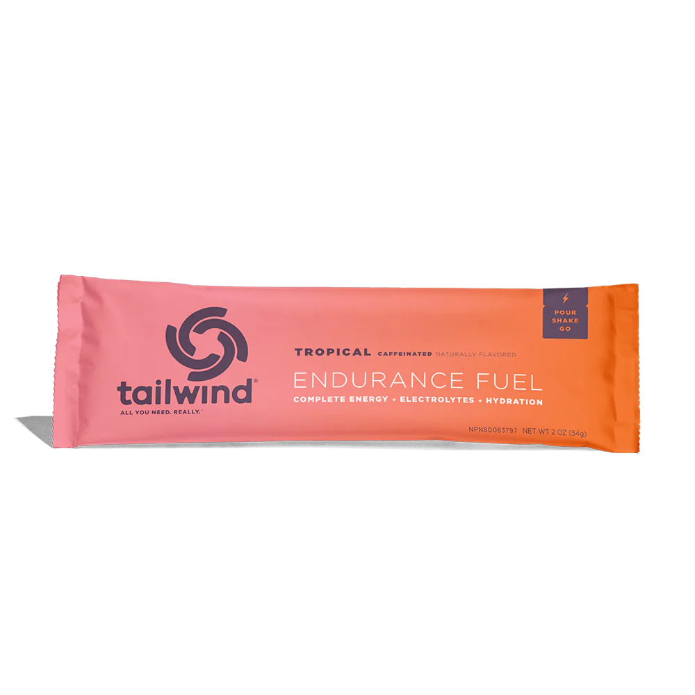 Endurance Fuel Caffeinated Singles by Tailwind in tropical orange, caffeinated nutrition for energy hydration and electrolytes during running and endurance activities