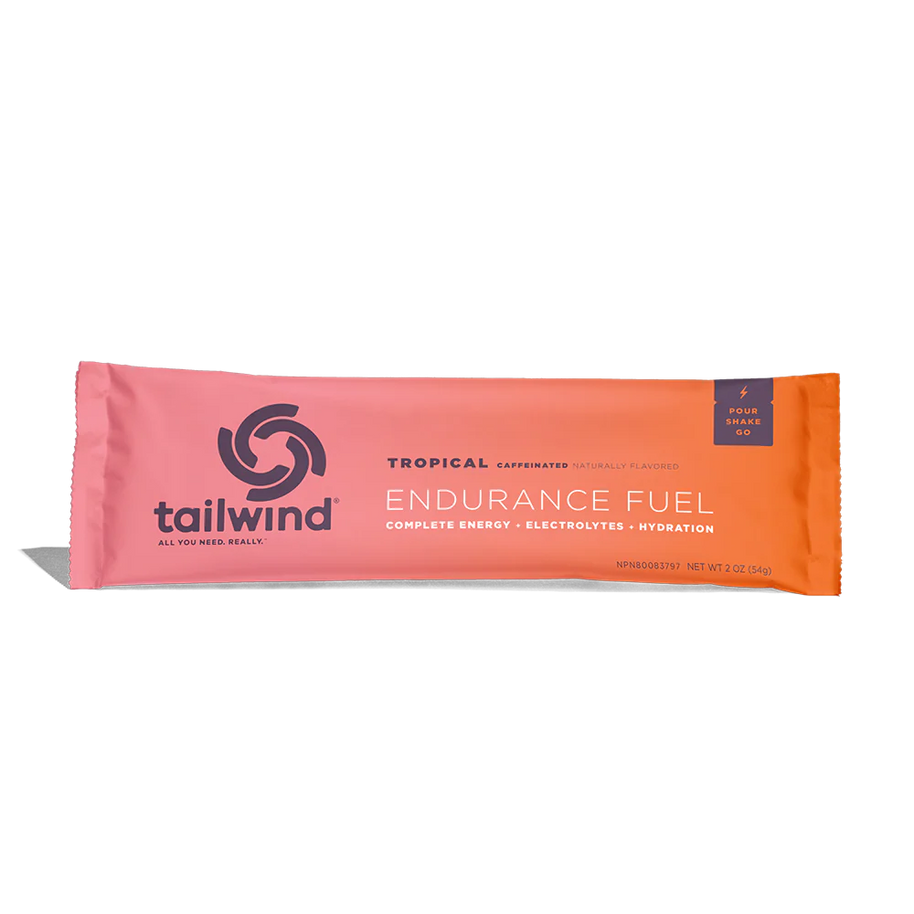 Endurance Fuel Caffeinated Singles by Tailwind in tropical orange, caffeinated nutrition for energy hydration and electrolytes during running and endurance activities