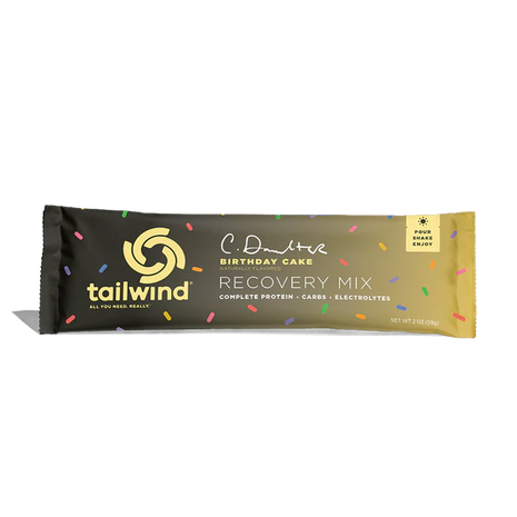 Recovery Birthday Cake (Limited Editon) by Tailwind in black and yellow packaging, protein recovery mix with carbs and electrolytes for runners