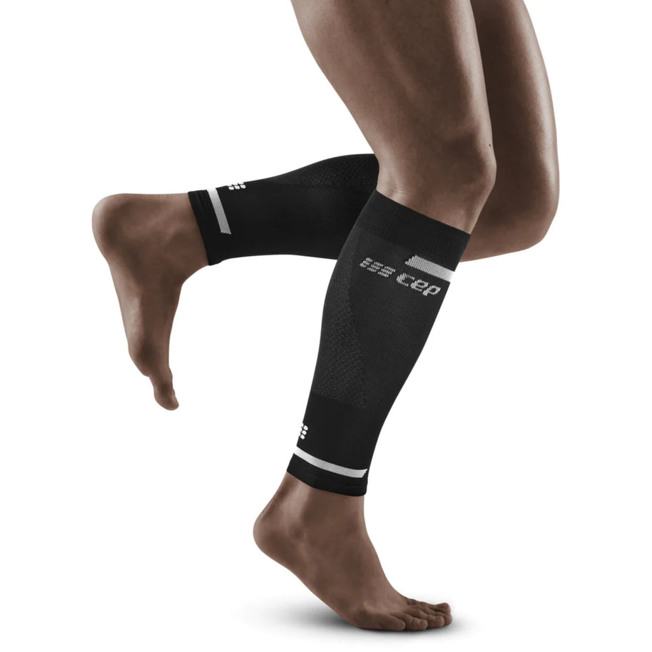 Run Compression 4.0 Calf Sleeves - Men by CEP Sports in black, medi compression for calf stabilization and vibration reduction during running