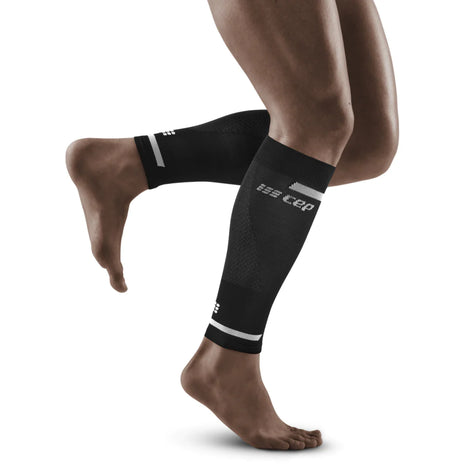 Run Compression 4.0 Calf Sleeves - Men by CEP Sports in black, medi compression for calf stabilization and vibration reduction during running