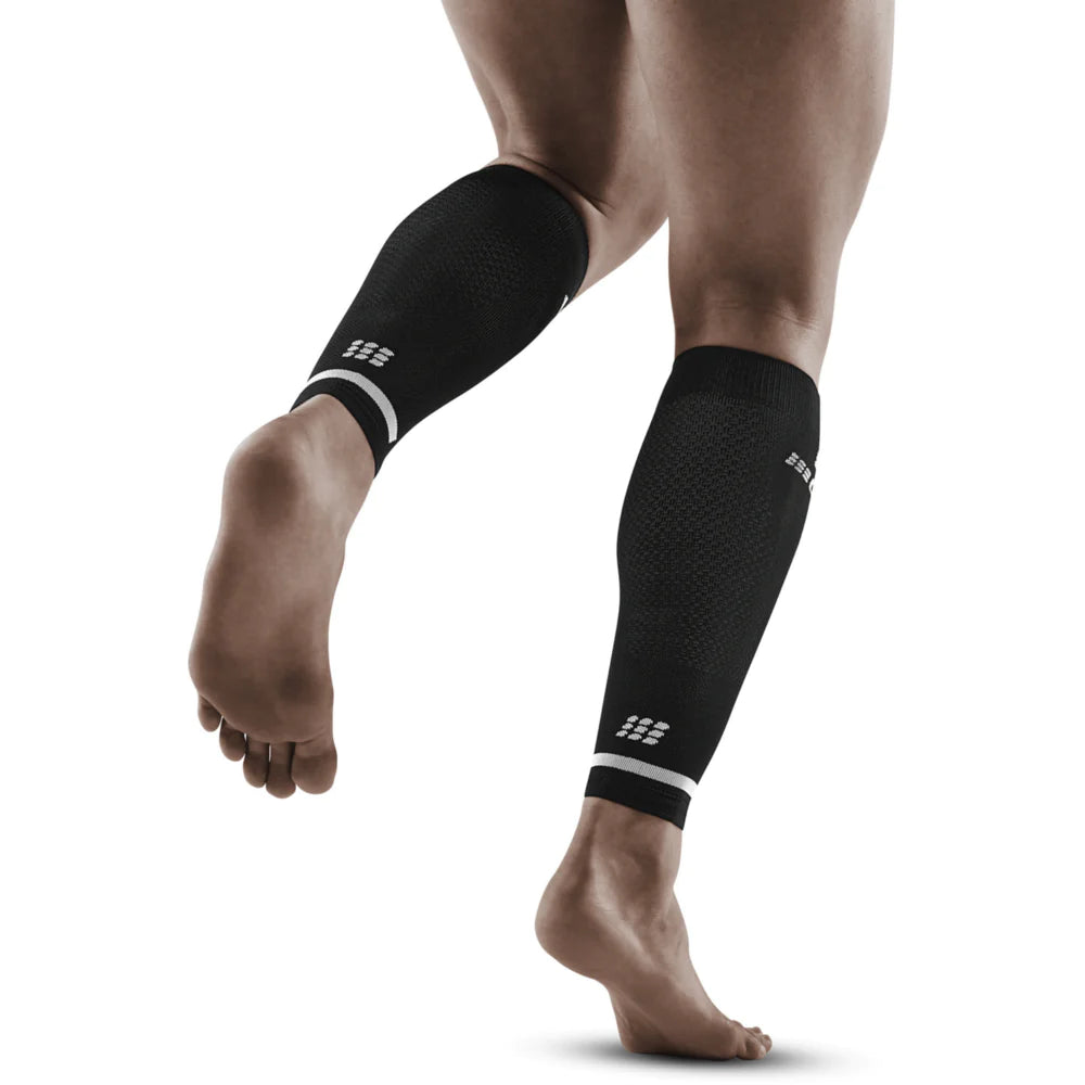 Run Compression 4.0 Calf Sleeves - Men by CEP Sports in black, medi compression to stabilize calves and reduce muscle vibration for running