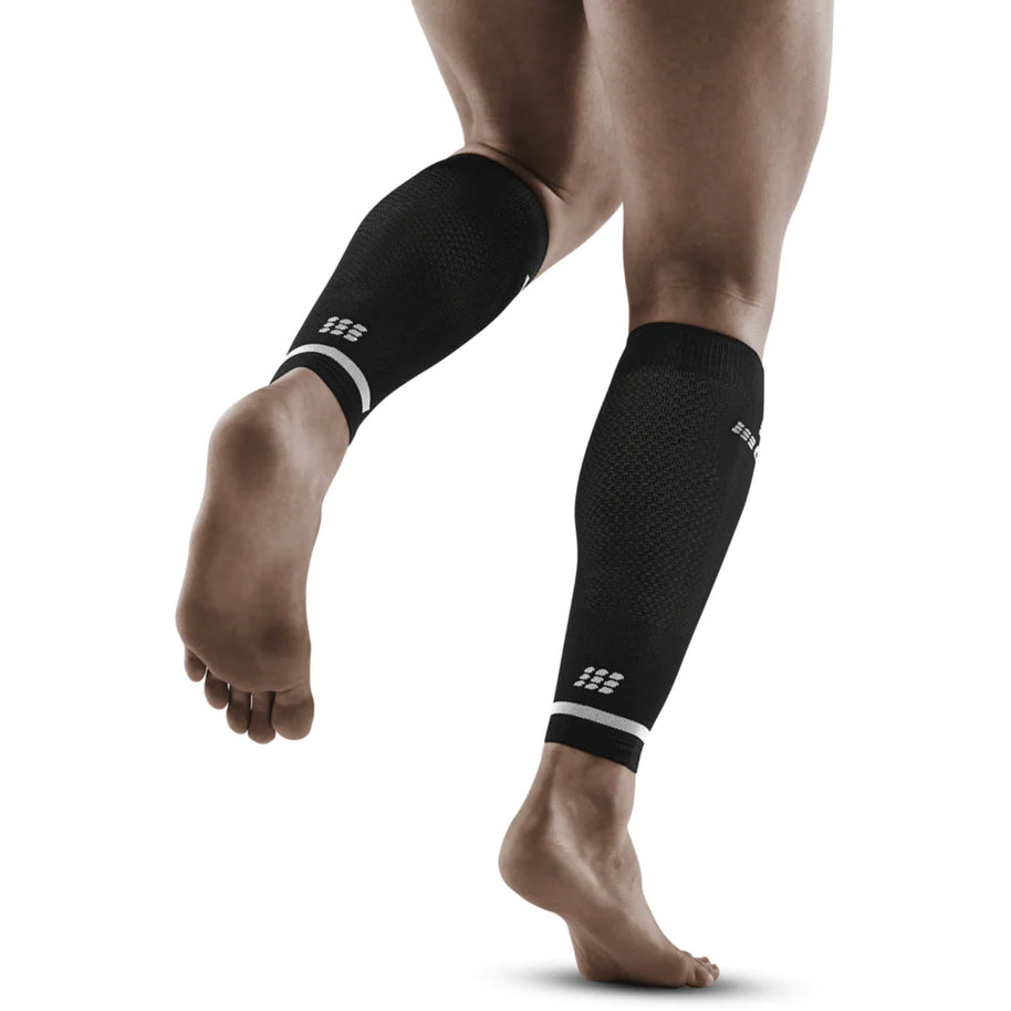 Run Compression 4.0 Calf Sleeves - Men by CEP Sports in black, medi compression to stabilize calves and reduce muscle vibration for running