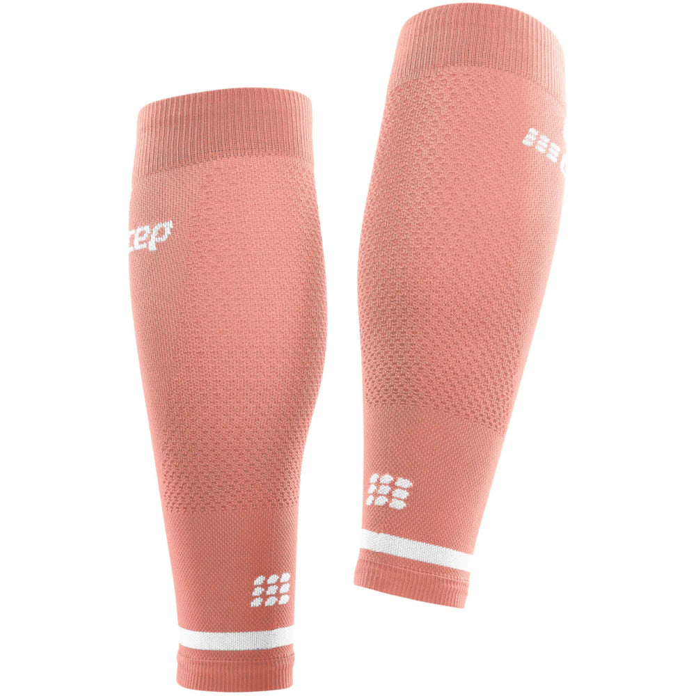 Run Compression 4.0 Calf Sleeves - Women by CEP Sports in coral, medi compression for calf stabilization, reduced muscle vibration, and improved circulation