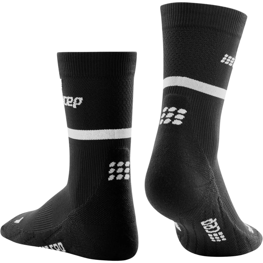 Run Compression Socks 4.0 Mid Cut - Men by CEP Sports in black with white stripes, stabilizing joints and reducing injuries for running.