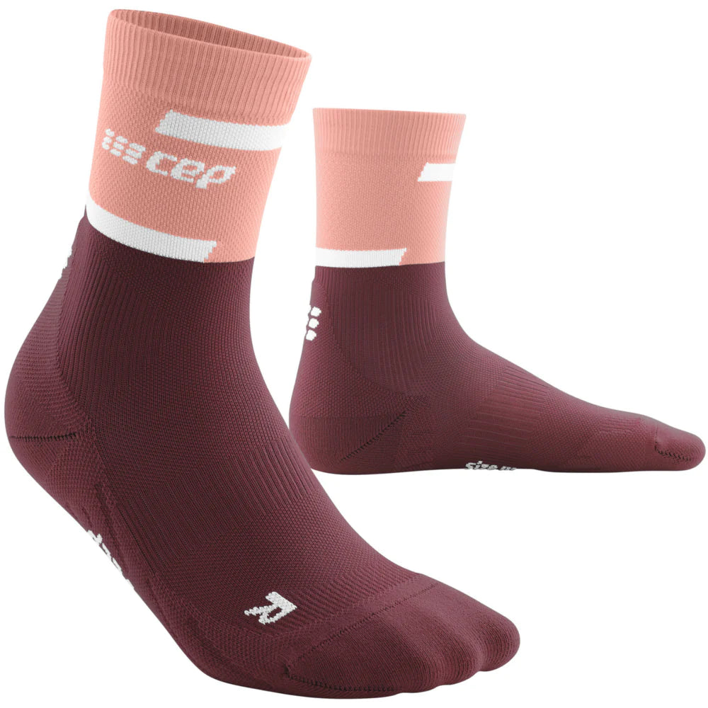 Run Compression Socks 4.0 Mid Cut - Women by CEP Sports in burgundy and pink, stabilizing and stimulating joints with wrinkle-free compression for injury prevention
