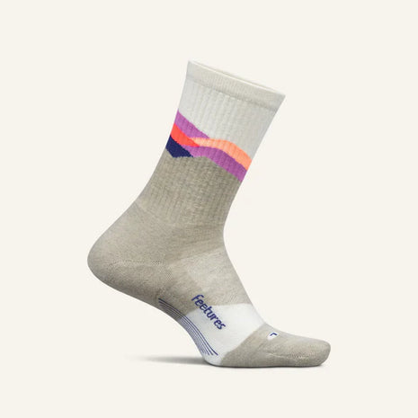 Trail Max Cushion Mini-Crew by Feetures in grey, white, and pink with anatomical design and targeted compression for trail running and hiking